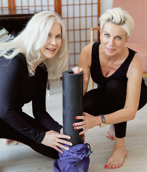 Woman feeling energetic and happy during a home workout.